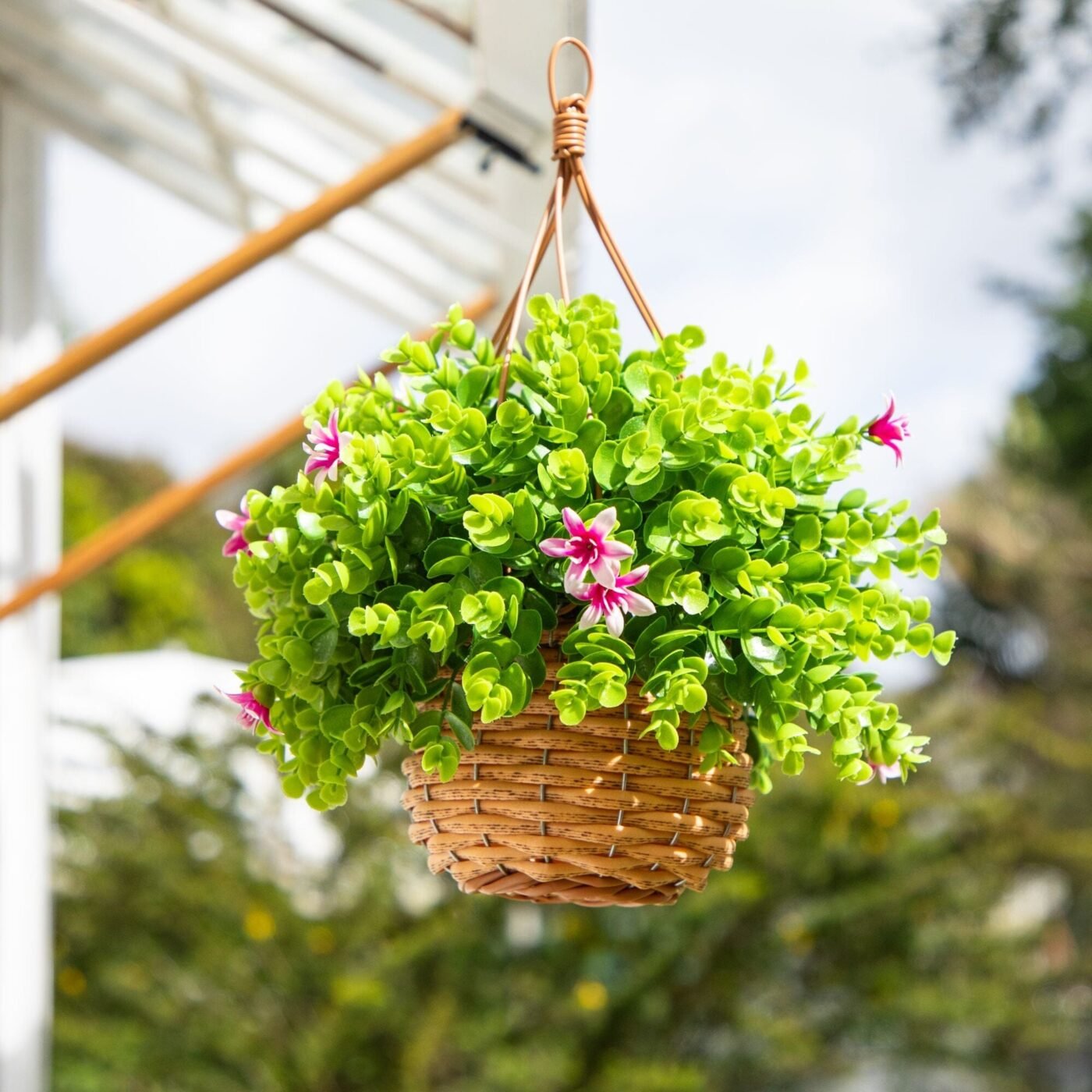 13" UV Resistant Artificial Lily and Eucalyptus Woven Hanging Basket (Indoor/Outdoor)