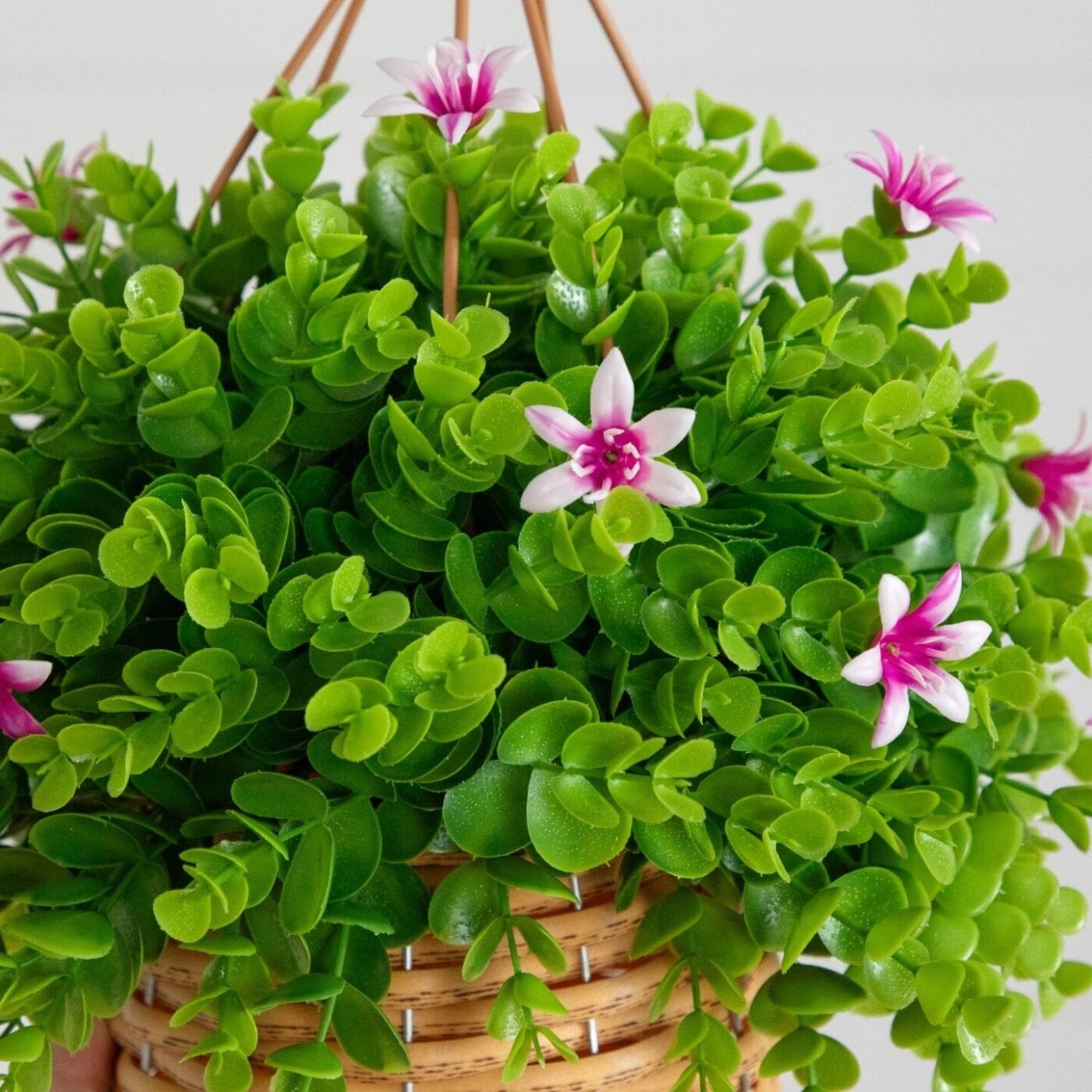 13" UV Resistant Artificial Lily and Eucalyptus Woven Hanging Basket (Indoor/Outdoor)